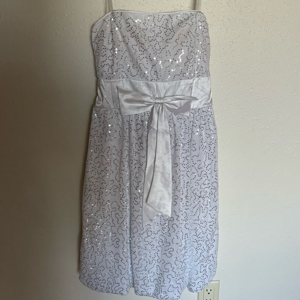 White sequence above the knee dress
